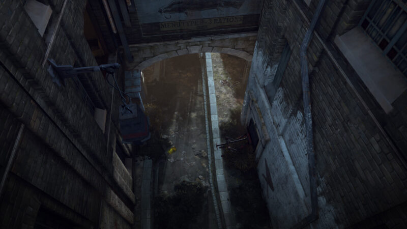 A narrow, dimly lit alleyway features weathered brick walls, overgrown plants, and a distant light source illuminating the cobblestone path, evoking a sense of abandonment and decay.