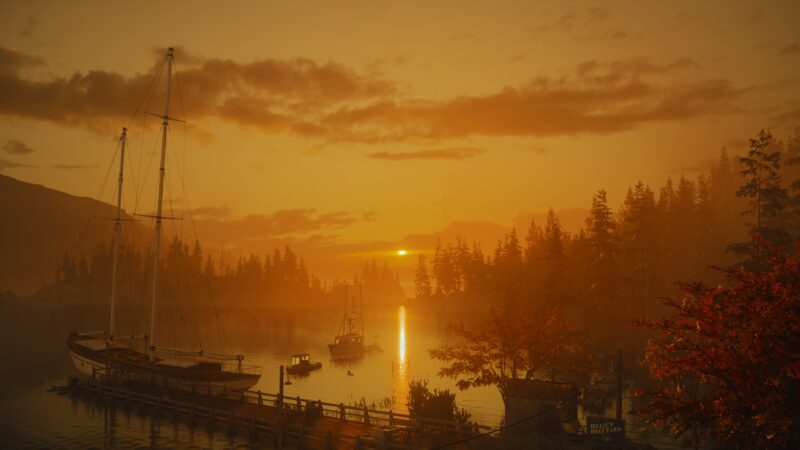 A serene lakeside scene at sunset, featuring two boats moored at a wooden dock, surrounded by silhouetted trees and a hazy orange sky with the sun setting in the distance.