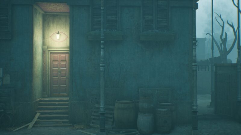 A dimly lit doorway with an eye symbol above stands in a foggy, atmospheric setting surrounded by decrepit walls, barrels, and shadowy trees in the background.