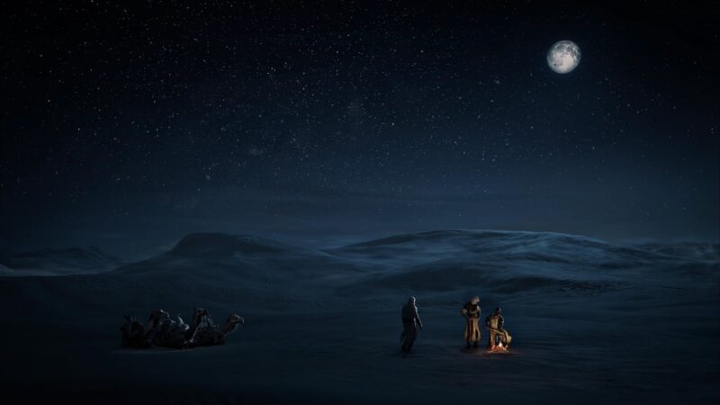 A serene night scene features two figures by a fire, surrounded by vast, snowy terrain under a starry sky and a bright moon in the background.