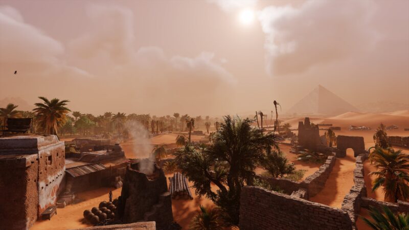 A sunlit desert landscape features ancient ruins, palm trees, and a pyramid in the distance, with wisps of smoke rising from a nearby settlement.