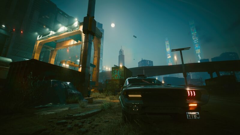 A futuristic cityscape at night features neon lights, towering skyscrapers, and a sleek car parked in a dilapidated area, illuminated by a full moon and glowing advertisements.