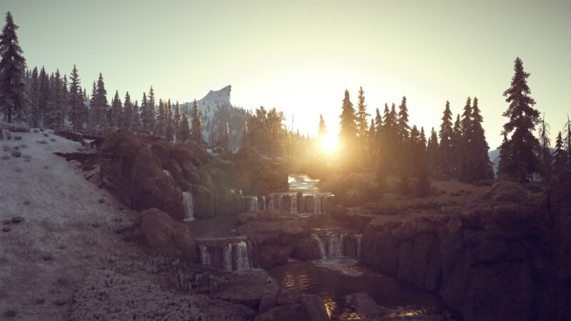 A serene landscape featuring a cascading waterfall surrounded by rocky terrain, evergreen trees, and a golden sunset illuminating the scene in a peaceful setting.