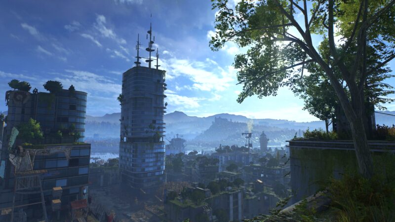 A sprawling urban landscape features towering skyscrapers amidst lush greenery, under a bright blue sky with distant mountains and a hazy horizon, creating a vibrant post-apocalyptic atmosphere.
