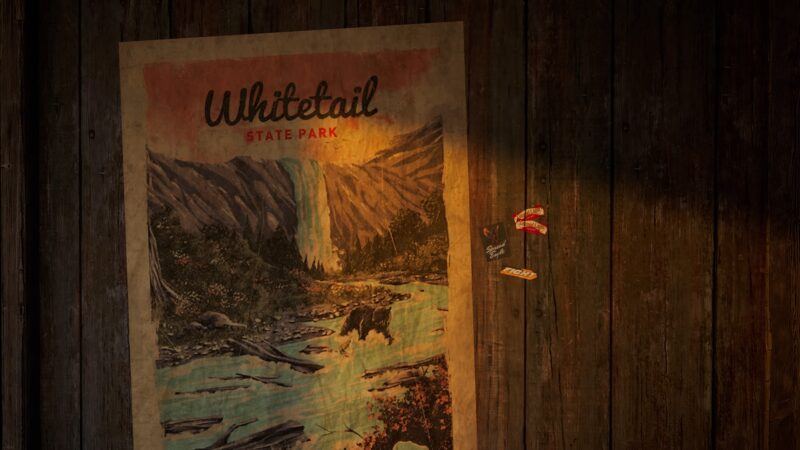 A vintage poster displays Whitetail State Park, featuring a waterfall, forested mountains, and a bear, mounted on a wooden wall with scattered items nearby.