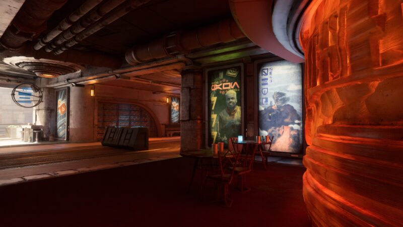 A dimly lit industrial setting features illuminated posters on walls, a wooden table with two chairs, and exposed piping, creating a gritty, futuristic atmosphere.