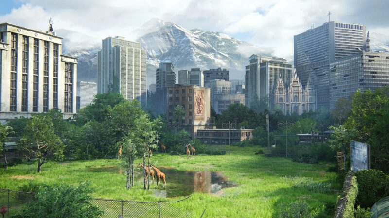 Overgrown cityscape featuring tall buildings, a serene green area with a pool of water, and giraffes grazing under a backdrop of mountains and a cloudy sky.