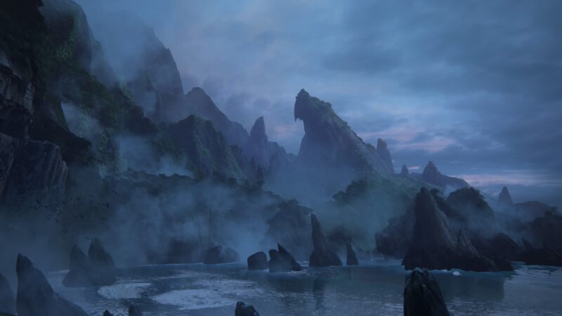 A misty coastal landscape features towering rock formations and a rocky shoreline, with dark clouds overhead and a serene body of water reflecting the muted light.