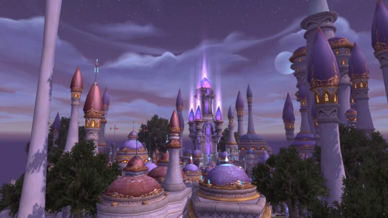 A magical cityscape features tall, ornate towers with purple domes, illuminated by soft, glowing lights against a twilight sky, creating an enchanting atmosphere.
