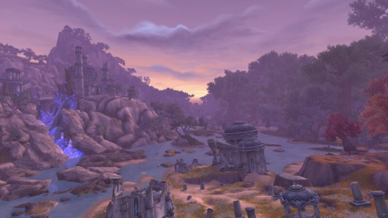 A serene landscape featuring a winding river, ancient ruins, misty mountains, and a vibrant purple sky at sunset, surrounded by lush trees and a waterfall.