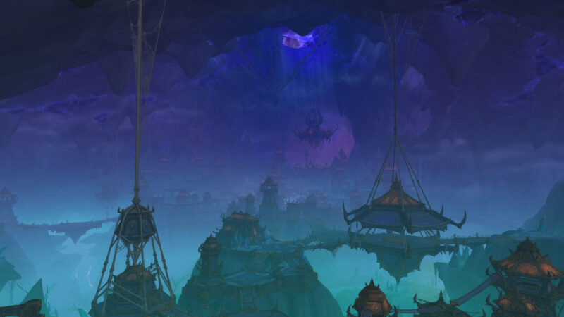 A sprawling, mystical underground city illuminated by purple and blue hues, featuring floating structures suspended by cables amidst jagged rock formations and a hazy atmosphere.