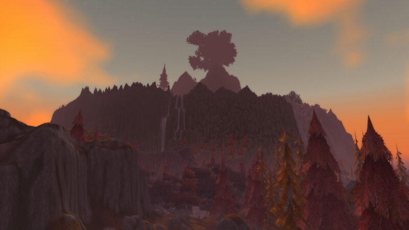 A rugged mountain landscape silhouetted against a sunset, featuring dark rocky cliffs, a prominent tree-shaped formation, cascading waterfalls, and vibrant orange and purple skies.