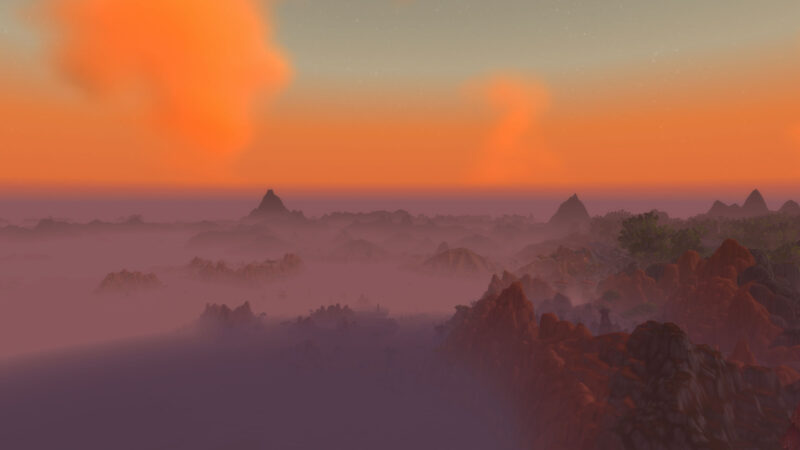 A breathtaking landscape features hazy mountains and valleys under an orange sky, with a soft mist enveloping the terrain, creating a mystical atmosphere.